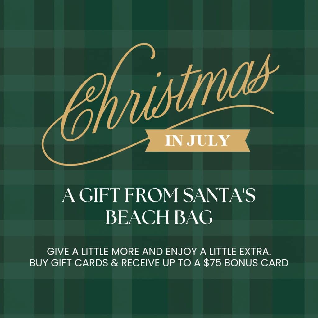 Green plaid background with gold cursive text reading 'Christmas' and a beige banner 'IN JULY' promoting gifts from Santa's beach bag.